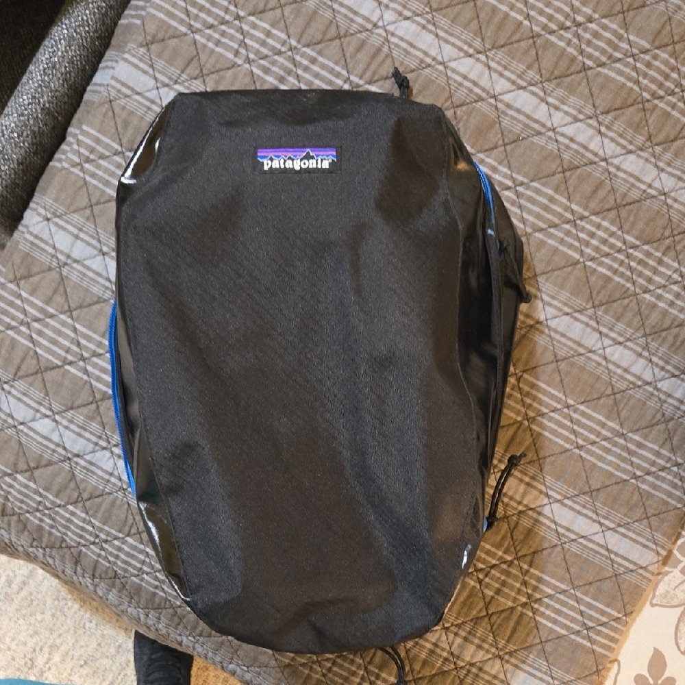 Patagonia Black Backpack with Blue Highlights